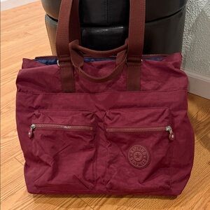 Kipling Burgundy Duffel Tote with Front Zip Pockets